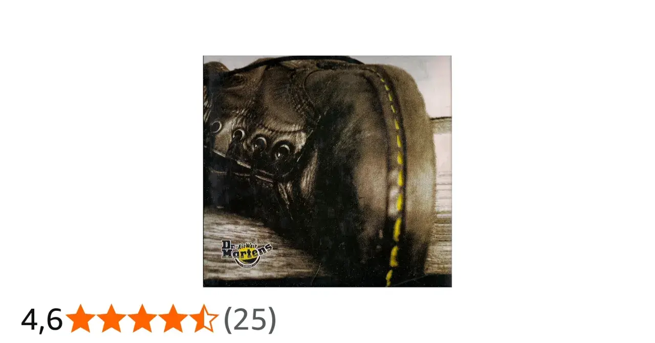 Nahaufnahme eines Dr. Martens AirWair Stiefels mit gelben Nähten. Der Unterschied liegt in der Qualität.
