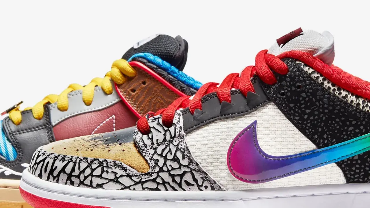 Bunte Nike SB Dunks mit verschiedenen Mustern und Schnürsenkeln. Die Bedeutung von Nike SB liegt in der Skateboarding-Kultur.