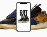 Ein Handy zeigt "GOT 'EM" über einem Paar Travis Scott Air Force 1. Das ist, was ist ein raffle, wenn man diese begehrten Sneaker ergattert!