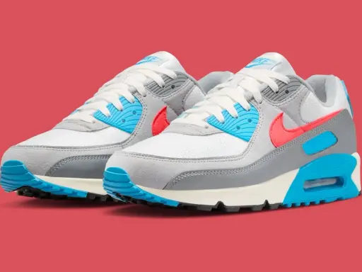 Nike Air Max 90 Sneaker in Weiß, Grau, Koralle & Blau. Eine tolle Ergänzung für jede Nike Air Max alle Modelle Liste.