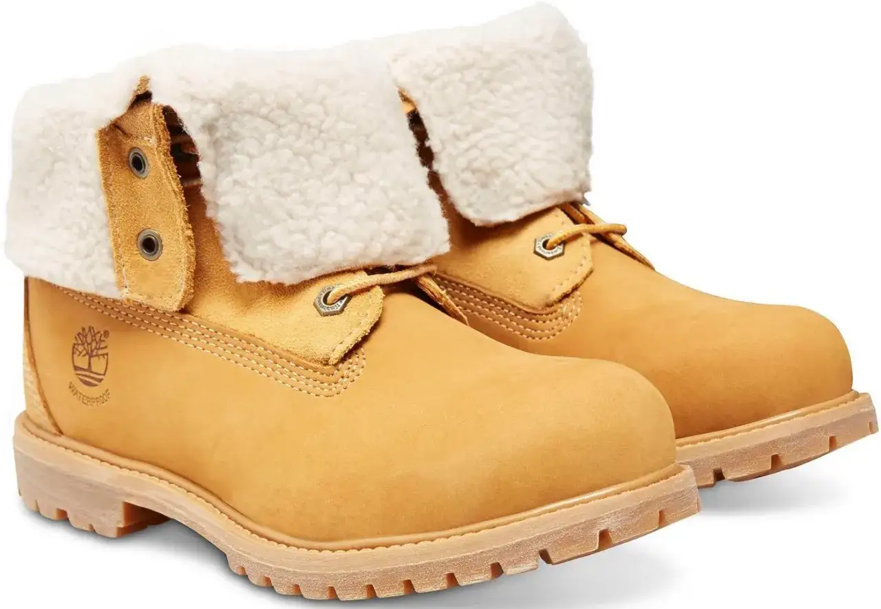 Warme, gefütterte Winterschuhe im Trend. Diese gelben Stiefel mit Teddyfell-Kragen sind perfekt für kalte Tage.